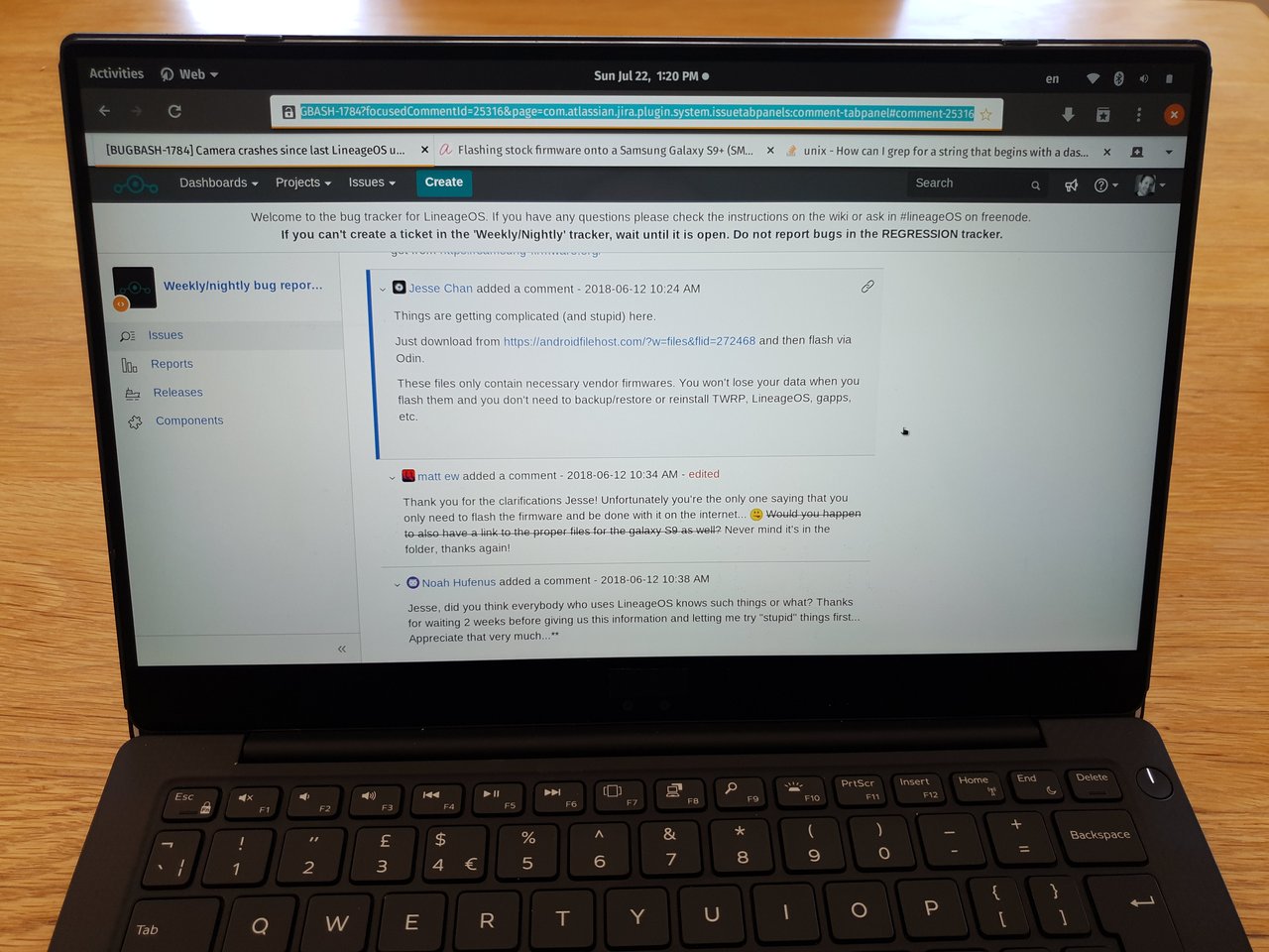 A photo of my XPS 13 on our dining room table. On screen is the Gnome Web browser showing the LineageOS bug thread for the S9 camera issue, focussed on the comment by Jesse Chan with the link to the vendor.img file that works to fix it.