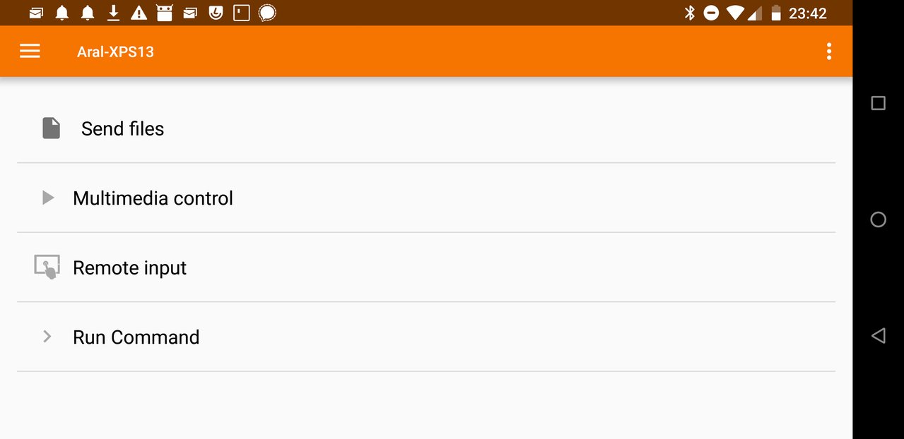 Screenshot of KDE Connect on my Samsung S9+ showing the name of my desktop Aral-XPS13 as well as a hamburger menu and a second hamburger menu with dots (let's not go there). There is a list underneath with the following options: Send files, multimedia control, remote input, run command. The menu bar is orange.