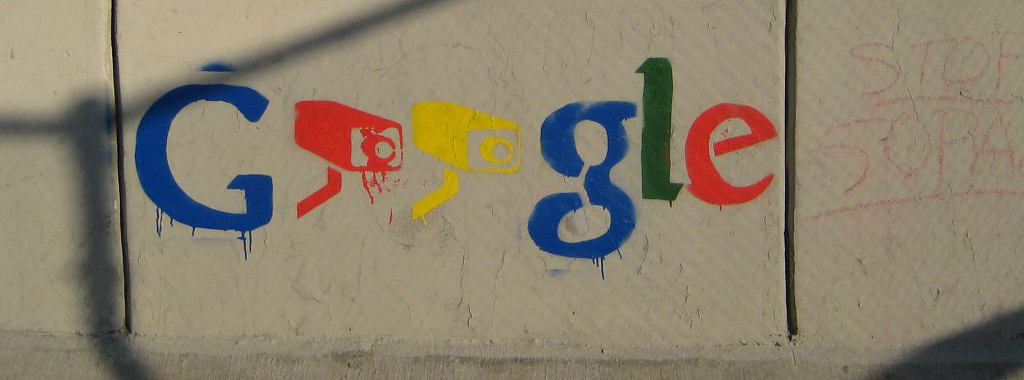 Google graffiti with surveillance cameras in place of the “o”s